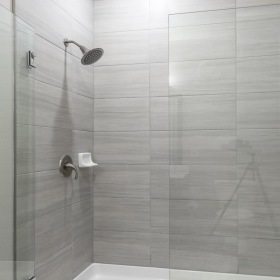 a bathroom with a glass shower